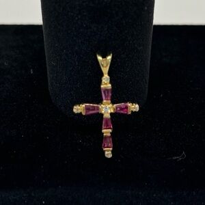 14k gold ruby and diamond cross pendant.